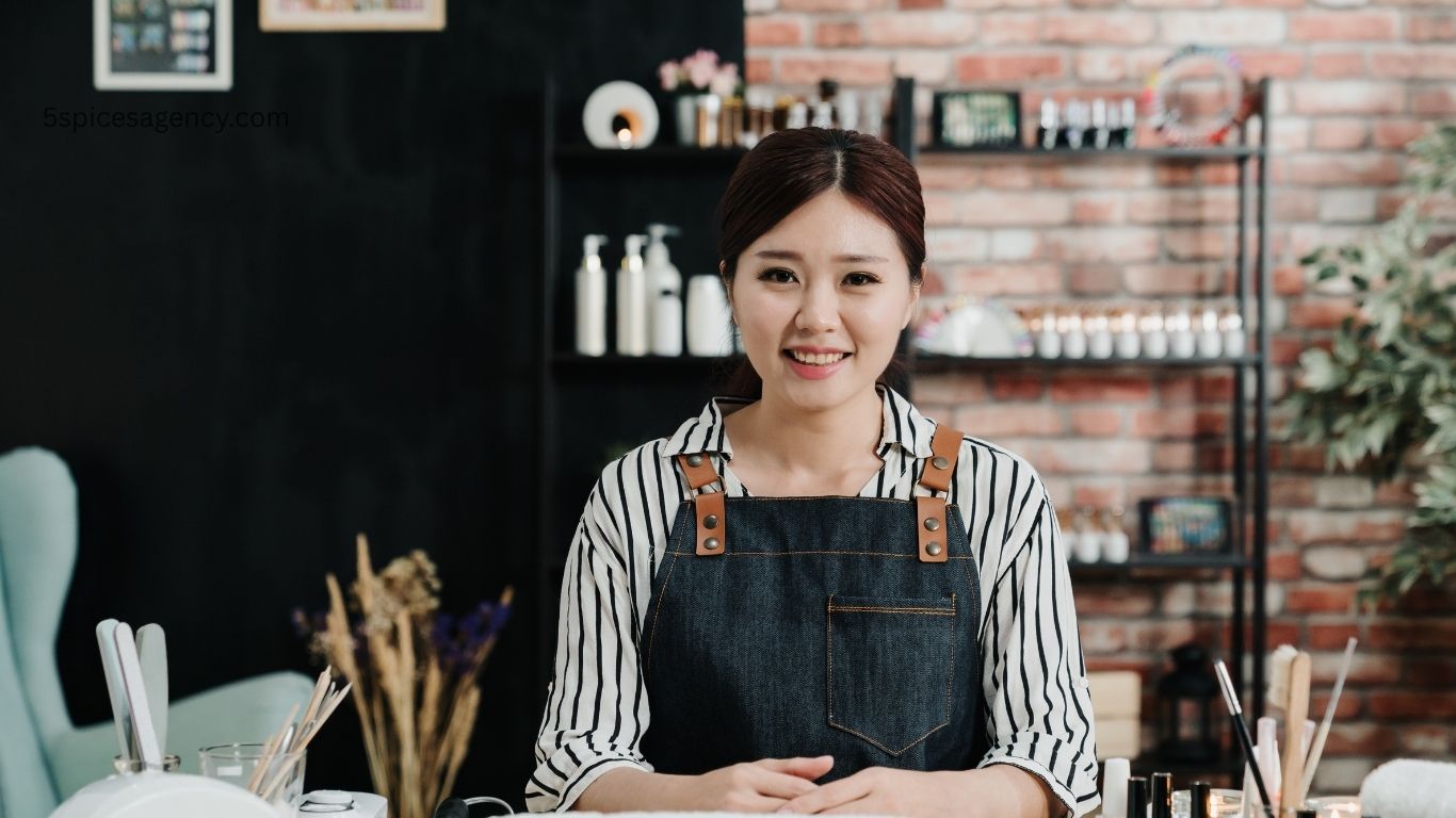 Happy nail salon clients and staff—professional front desk answering calls