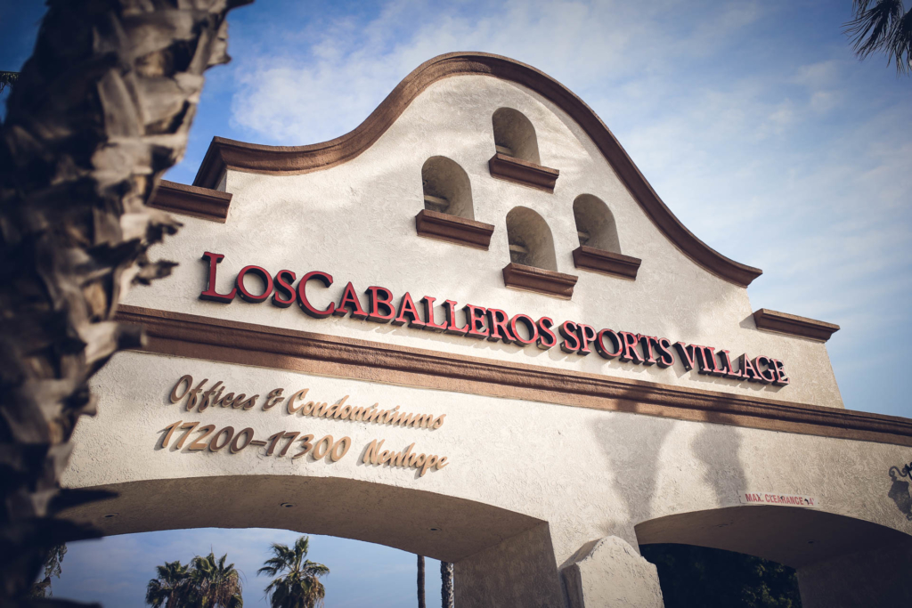 Los Caballeros Sports Village arch